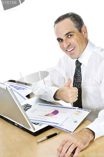 Image of Businessman at his desk on white background