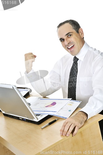 Image of Businessman at his desk on white background