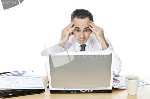 Image of Businessman at his desk on white background