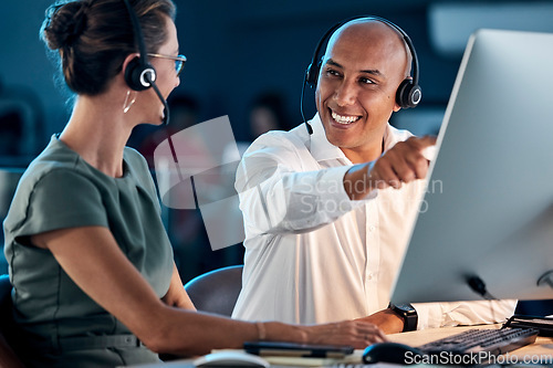 Image of Call center, customer service and contact us, training and team leader help coworker, crm and communication at computer with headphone. Telemarketing, man and woman working together, support and call