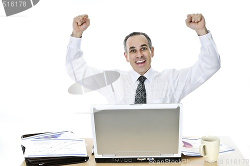 Image of Businessman at his desk on white background