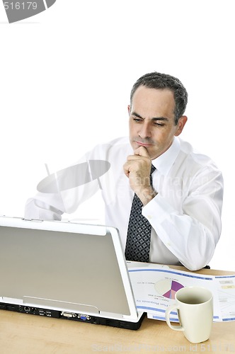 Image of Businessman at his desk on white background