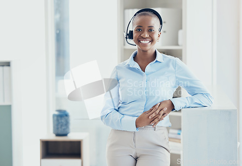 Image of Call center, smile and portrait of black woman in office for telemarketing, customer support or consulting. Contact us, communication or help desk service with employee for business, crm and kpi