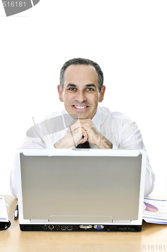 Image of Businessman at his desk on white background