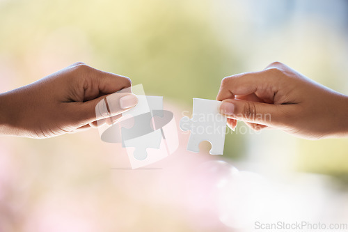 Image of Puzzle, hands and businesspeople connected for company merger and support. Partner, collaborate and problem solving for synergy and successful business vision. Unity, connect and puzzle pieces
