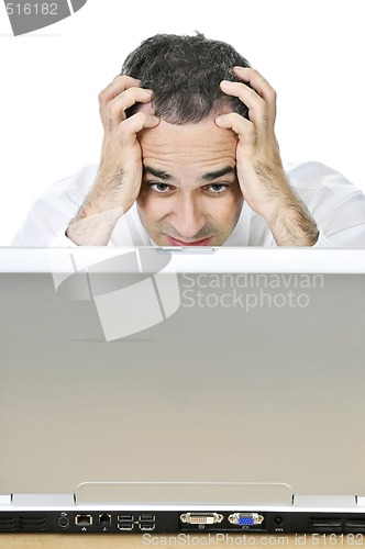 Image of Businessman at his desk on white background