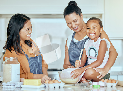 Image of Cooking, kitchen and grandmother teaching child with flour, butter and egg for breakfast, dessert or food and bonding together. Elderly woman, mom and girl kid baking pancakes in a home portrait