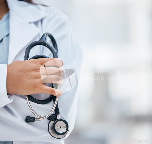 Image of Zoom of doctor, healthcare or stethoscope in hand for cardiology, medical leadership or health wellness in hospital. Medicine, insurance or woman nurse for help, support or heart surgeon in clinic