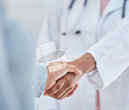 Image of Handshake, trust and thank you with patient and doctor or medical worker shaking hands, greeting or introduction during consultation. People hand welcome gesture or welcome, partnership or help