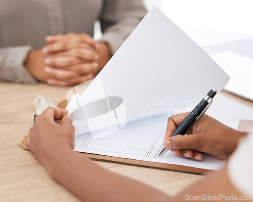 Image of Legal paperwork, signature and document in an office for interview, insurance form or contract with agent during a meeting. Woman writing on paper for healthcare policy, tax or loan application