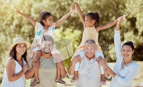 Image of Family, love and outdoor, generations in park have fun out in nature, big family together and smile in portrait. Parents, grandparents and children bonding, arms up and happiness with care.