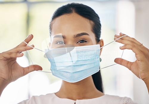 Image of Face mask, woman and covid healthcare for medical protection, professional safety and covid 19 pandemic vaccine center. Healthcare, a worker with mask and clinic at coronavirus virus treatment clinic