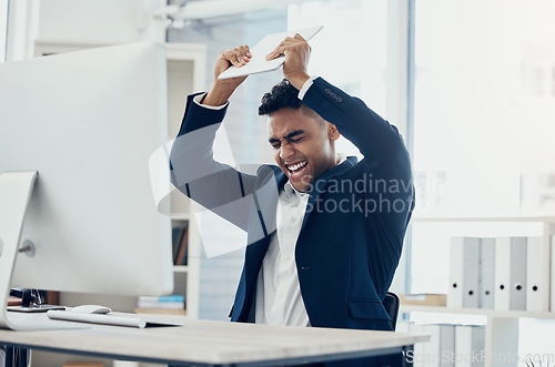 Image of Angry, stress and businessman breaking technology in digital marketing office, advertising startup or company after 404 glitch. Mad, shouting or aggressive worker smashing tablet in rage from mistake