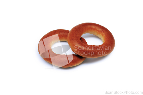 Image of Two bagels on white.