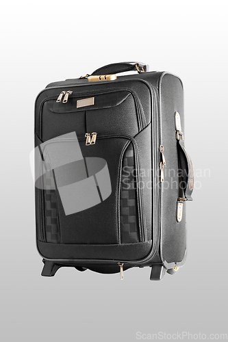 Image of Suitcase on wheels.