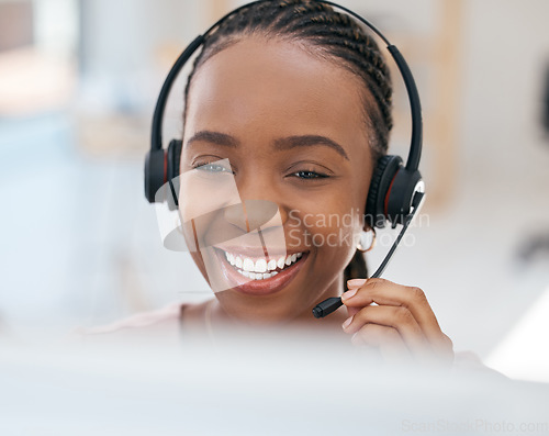 Image of Black woman, smile and consulting in call center, contact us or telemarketing communication at the office. Happy African American female employee consultant with headset smiling for customer service