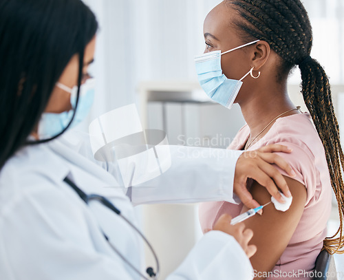 Image of Doctor, covid mask and vaccine of a woman patient with medicine injection in hospital or clinic. Healthcare, nurse and consulting medical worker with health vaccination and black woman consultant