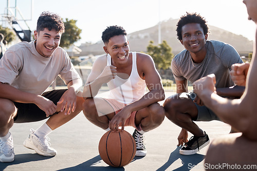 Image of Basketball player, team and group talking for motivation and game strategy planning together with training coach in outdoor sun. Diversity basketball friends talking or listening to motivate speech