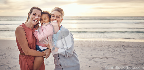 Image of Lesbian, couple and portrait of family on beach together for travel vacation, happy and relax bonding by sea side. Happy homosexual parents, child smile and ocean sunset or relaxing in summer