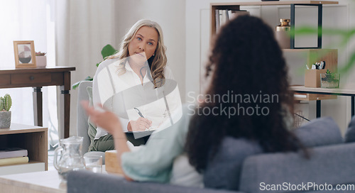 Image of Psychologist, woman in therapy and counseling meeting talking mental health, work burnout and anxiety or depression. Therapist office, mind wellness and professional psychiatrist to help psychology