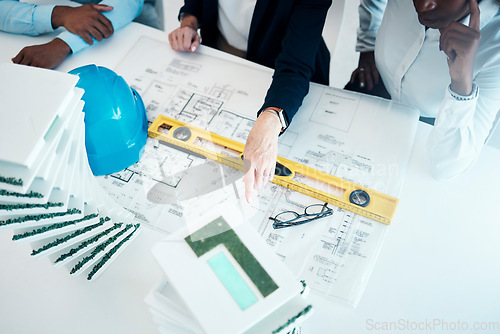 Image of Floor plan architecture and engineering meeting planning a creative office building or apartment building construction. Leadership, teamwork and designers hands working on a group development project