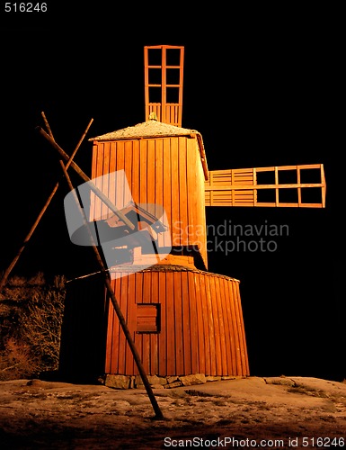 Image of Wooden Windmill at Night