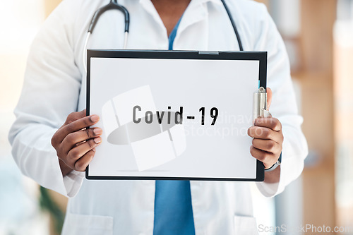 Image of Doctor, covid 19 paper sign and clipboard, poster and information report for healthcare, global pandemic and hospital consulting. Medical worker hands holding marketing note for corona virus disaster