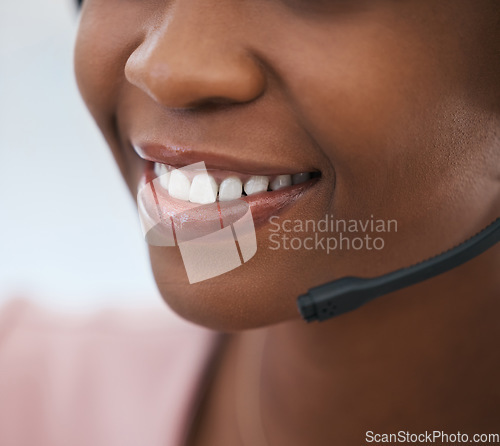 Image of Face, mouth and smiling customer service operator with client advice using a headset. Support, telemarketing and contact us with call center staff happy to help, consult customers in communication