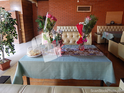 Image of Bouquets of flowers on the table.