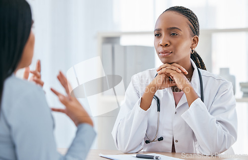 Image of Doctor, medical and healthcare consultation of a black woman health worker with a patient. Consulting insurance, hospital and cardiology employee busy with medicine consultant help talk in a office