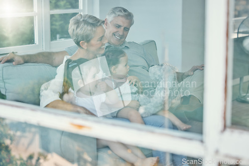 Image of Window, sofa and grandparents and children watching tv, relax in home living room and streaming subscription television movie. Happy family love, quality time and elderly people bond with grandkids