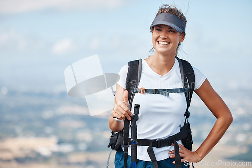 Image of Hiker woman, hiking and thumbs up outdoor with smile in adventure portrait, travel and success trekking up mountain. Fitness, freedom and happy to win, backpacking and tourist in nature.