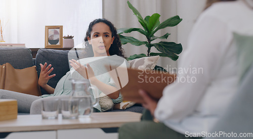 Image of Stress, anxiety or pregnant woman talking to psychologist on mental health, support or perinatal depression healthcare clinic sofa. Pregnancy, fear or scared mother on couch in psychology counseling