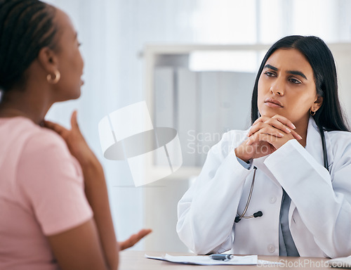 Image of Doctor, patient consultation and medical healthcare discussion with women at consulting clinic, hospital and community gp. Black woman, office and health care therapist listen during routine checkup