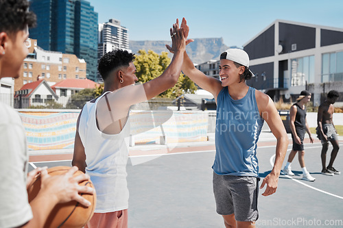 Image of Basketball, high five and sports team hands in celebration of game win, match or training. Teamwork, sport and fitness by basketball player hand in support of motivation, success and goal at court