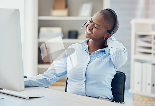 Image of Black woman, neck pain and call center agent on office computer in crm consulting or contact us telemarketing company. Stress, burnout and muscle tension for worker on b2b customer support technology