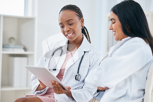 Image of Doctor, women and digital tablet in a hospital for healthcare, planning and medical innovation. Medicine, vision and health experts collaboration with medic intern discussing online treatment plan