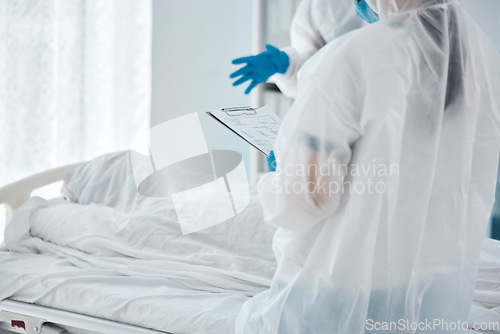 Image of Death, covid and doctors writing paper for patient in a bed at a hospital due to virus. Healthcare, medical and clinic workers with communication, report and help during health crisis in pandemic