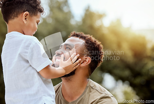 Image of Dad, boy touch face in outdoor park or backyard for summer bonding, happiness together and sunshine. Father son, happy black man in nature for love smile and quality time with child