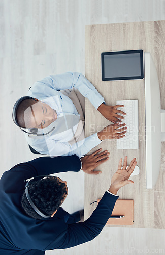 Image of Training, call center and business people at desk with top view for telemarketing, consulting and customer support. Coaching, learning and help with employee in office for contact us, crm and kpi