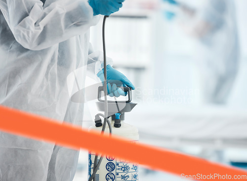 Image of Cleaning, disinfection and person in hazmat suit in lab with sanitizer to clean germs, virus exposure and spray. Covid, hygiene and medical worker sanitizing hospital, medical lab and clinic in ppe