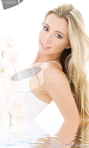 Image of blonde in cotton underwear with orchid