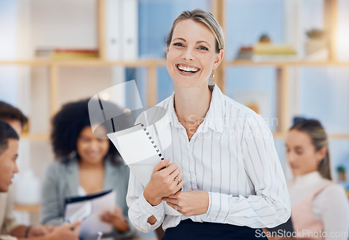 Image of Meeting, leadership and happy with a business woman holding documents in the boardroom for training or coaching. Marketing, team and manager with a female employee working with a group in the office