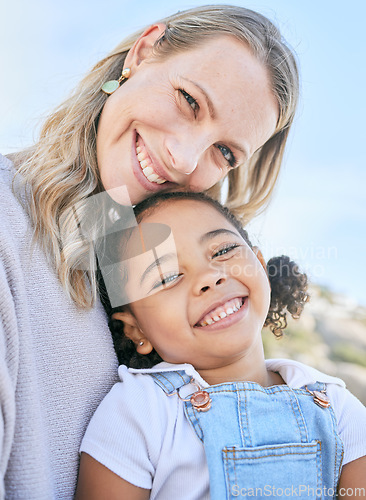 Image of Adoption, mother and girl smile, happy and bonding together on weekend break, loving and holiday. Diversity, portrait and foster mama with adopted kid love, have fun and playful for summer vacation.