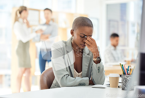 Image of Black woman, headache or stress at desk in busy office, marketing agency or advertising company with target goals fail. Worker or employee with anxiety, burnout and mental health in creative business