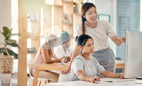 Image of Employees, team and computer research with speaking, planning or project outcome and analysis at office desk. Happy, Asian manager and woman with digital marketing, discuss work and conversation