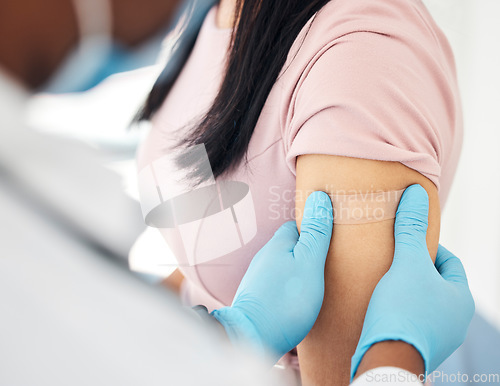 Image of Covid, vaccine and bandaid with hands of doctor and woman arm for medicine, medical and consulting. Wellness, first aid and healthcare with nurse and patient for virus, flu and treatment injection