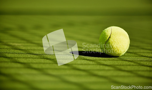 Image of Tennis, sport and fitness with tennis ball on turf with green closeup and texture, sports match and competition. Training, active and ball on tennis court, outdoor tournament and competitive game.