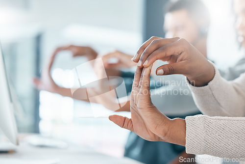 Image of Call center, contact us and team stretching hands and ready to start networking, talking and helping clients with advice. Communication, consultants and agents training fingers in a warm up exercise