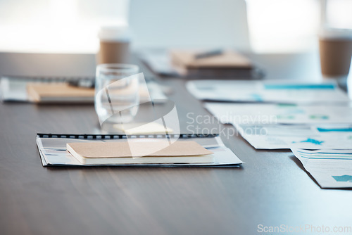 Image of Notebook, paper or documents on desk in empty office for marketing data analysis, target audience research or kpi analytics. Zoom, paperwork chart or graph in business survey of company finance goals